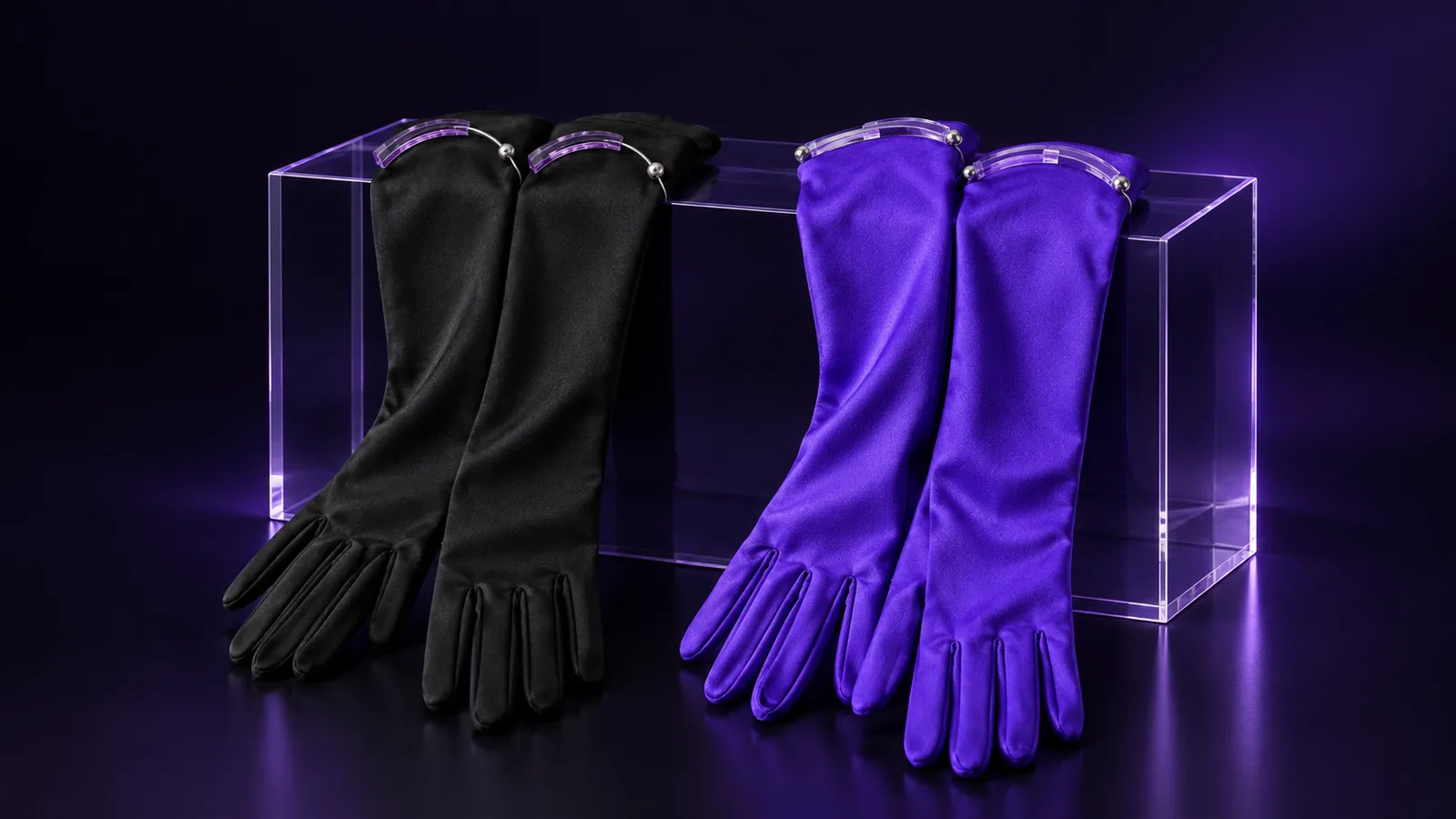Black and electric violet opera gloves draped over an acrylic block